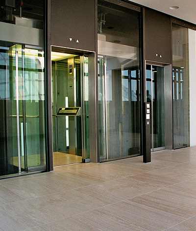 public glass lift